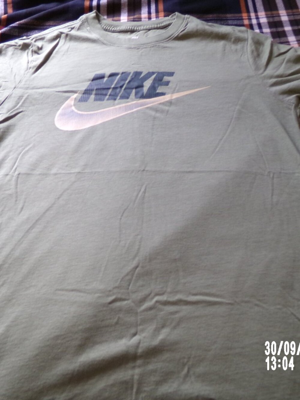 Size M sage green Nike t-shirt
